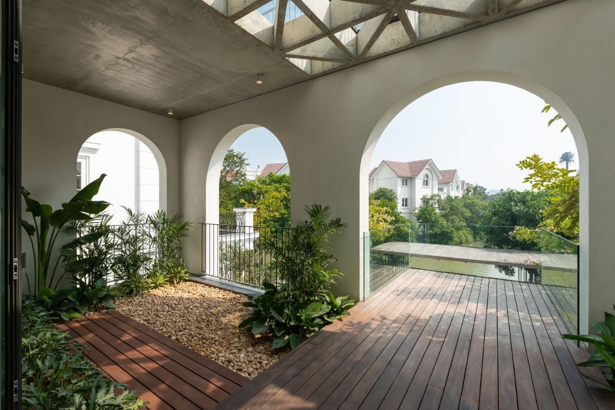 Waterfront villas redesigned for tropical living, emphasizing microclimate and integration with nature