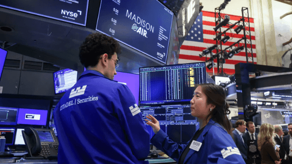 Oil rises toward $100 a barrel as US stocks hit new records