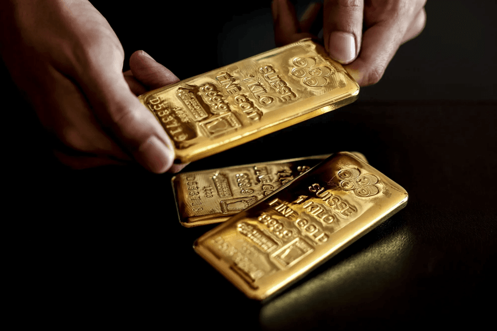 Gold prices slide further as USD strengthens on hawkish signals from the Fed