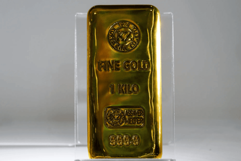 Gold price slides more than $100/oz as oil breaks above $100 a barrel