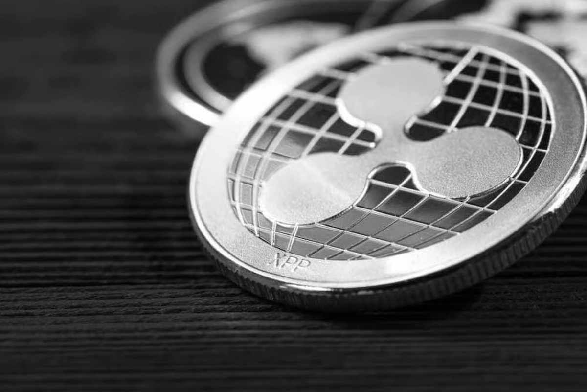 XRP prints a fresh TD Sequential buy signal after pullback; near-term target around $1.80