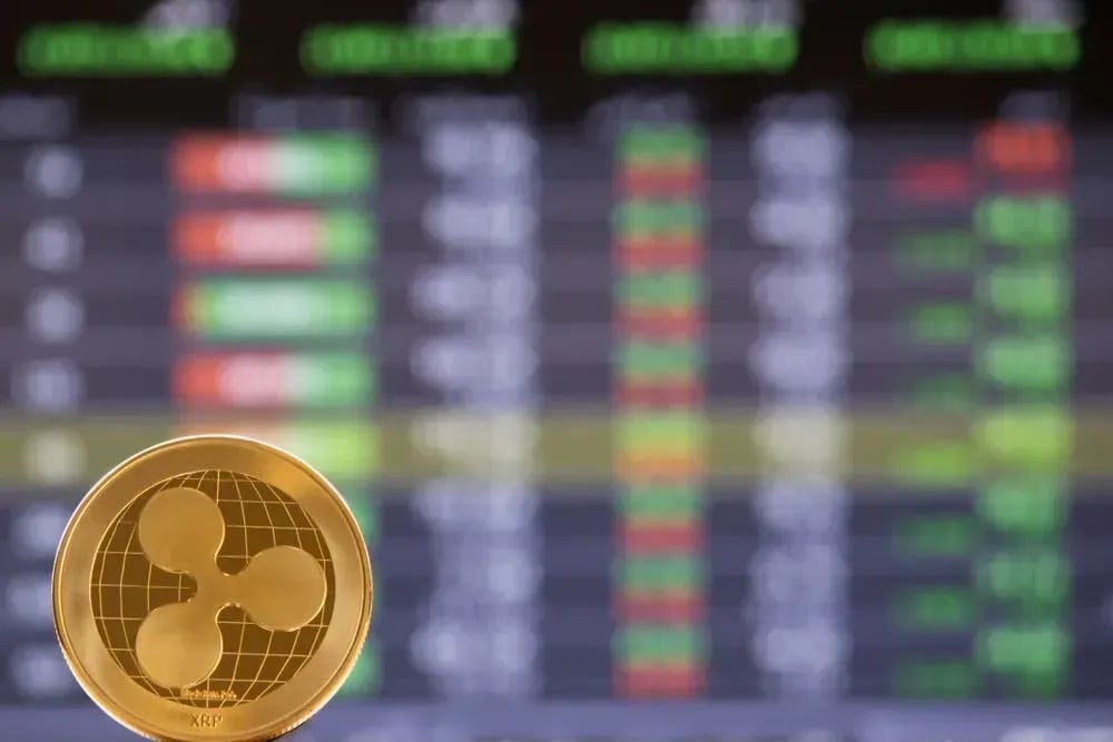 XRP at key $1.40–$1.45 zone as liquidation pressure builds